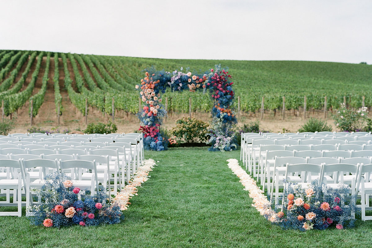 Winery wedding ceremony in the vineyard at Stoller Family Estate